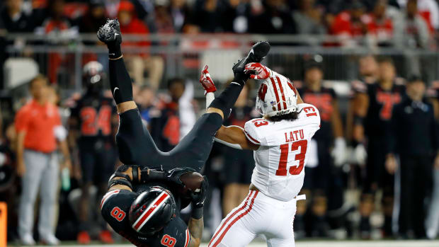 Wisconsin safety Kamo'i Latu flips Ohio State tight end Cade Stover to force an incompletion.